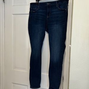 Dark wash mid-rise skinny jeans